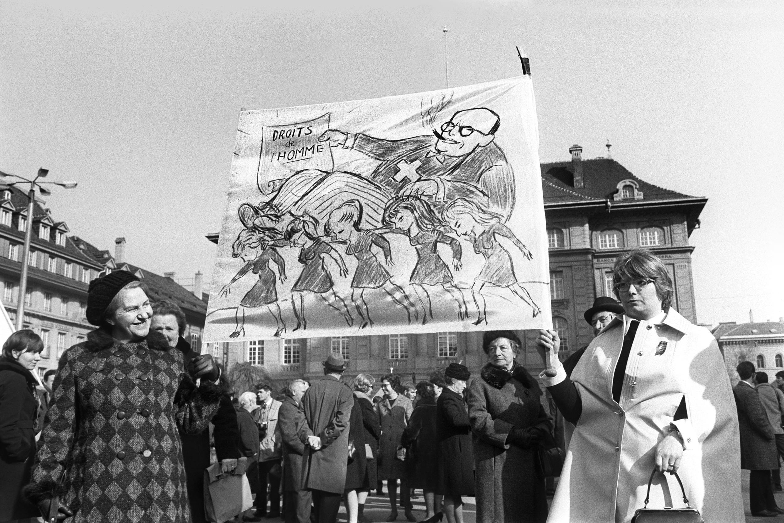 Black and white archive photo of women demonstrators