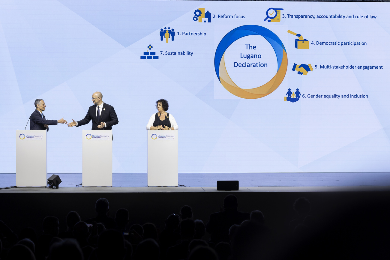 Thre politicians on stage